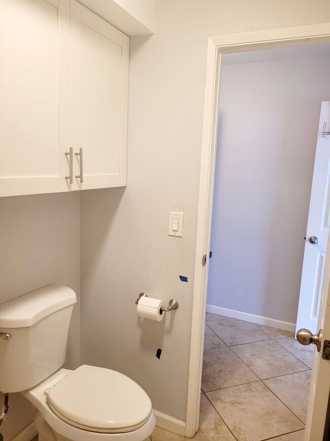 Building Photo - AVAILABLE | 2 Bedroom, 1 Bathroom Condo with 1 Assigned Parking Stall