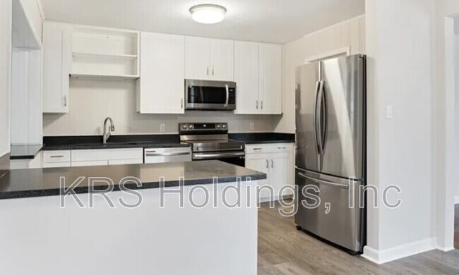 Building Photo - 1210 Downing Rd