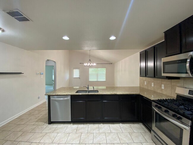 Building Photo - Spacious 4-Bedroom Home with Washer & Dryer Included in Riposa Vita Community!
