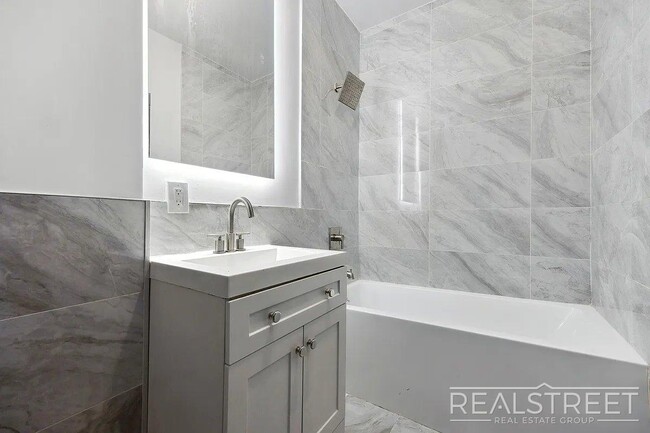 Building Photo - Timelessly Renovated Historic Triplex with...