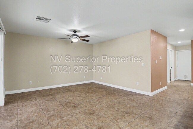 Building Photo - NW!! 4 bedrooms!! Bed & Bath DownStairs!!! RV Parking!!! Synthetic Grass Front yard!! Real Grass ...