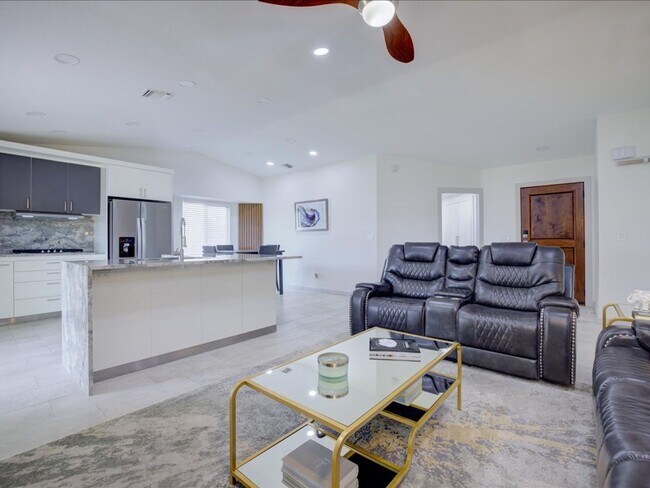 Building Photo - 3 Bedroom 2 Bathroom: Partially Furnished home!! **UNFURNISHED-RENTAL PRICE IS $3,000.00**
