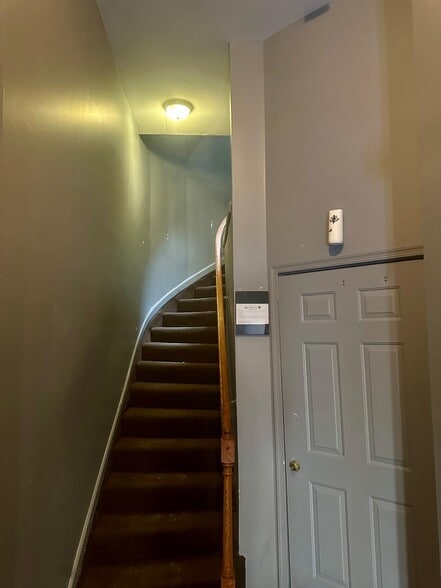 Stairway up to apartment 2 - 1426 Madison Ave