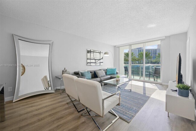 Building Photo - 19370 Collins Ave