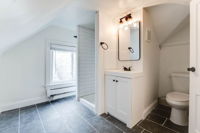 Building Photo - Beautifully Updated 4 BR/2 BA Upper-Level Duplex in Minneapolis with 2-Car Garage!