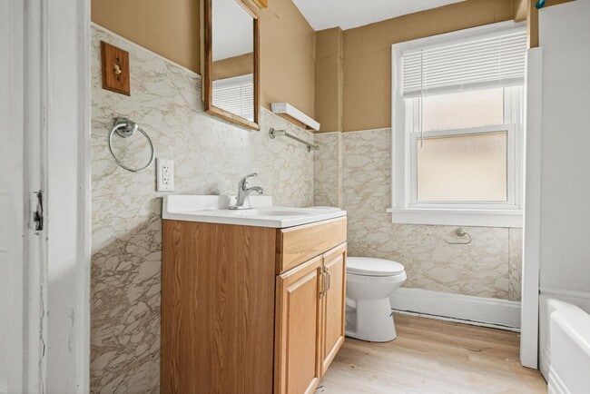 Building Photo - Bright living ? cozy dining flow for everyday comfort and easy entertaining.