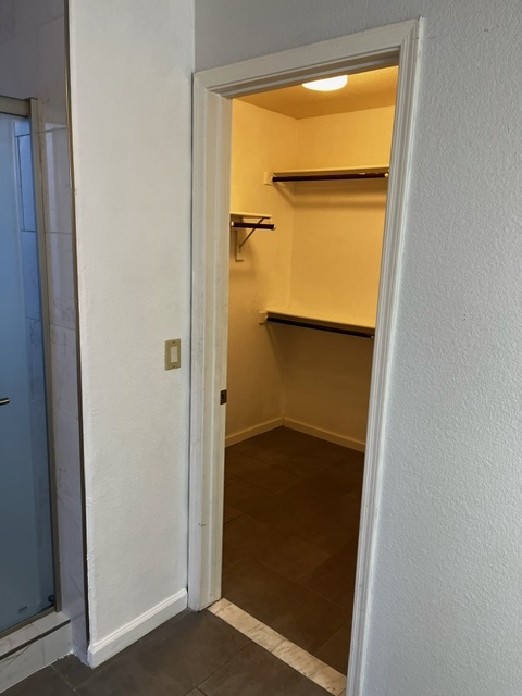 Walk in closet primary bedroom - 15300 N 85th Dr