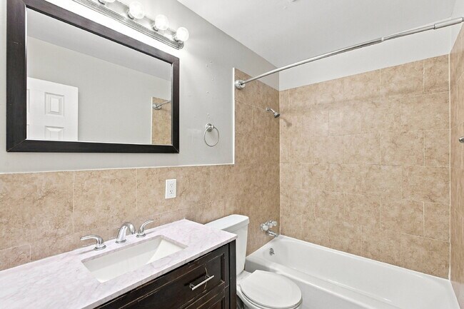Building Photo - $2,240.95 with $300 Off the first month's rent, 4 Beds, 2 Baths, Triplex Unit in Littleton with W...