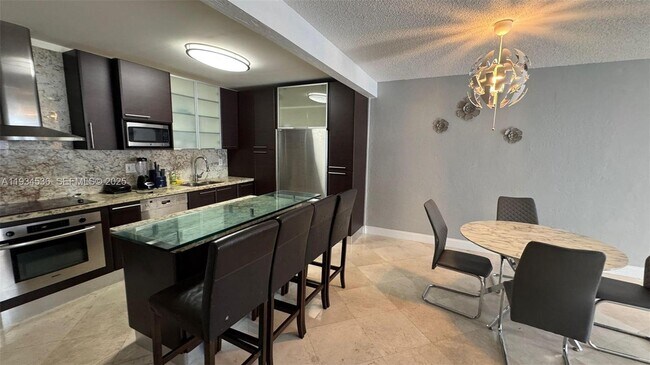 Building Photo - 19390 Collins Ave