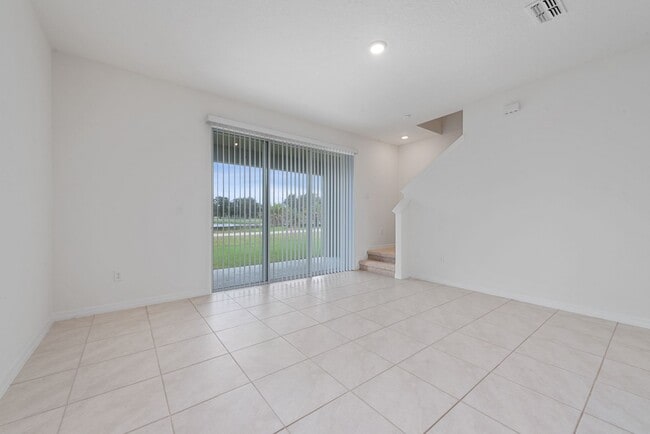 Building Photo - Nice 3/2.5 Townhouse with 1-Car Garage in Atria at Ridgewood Lakes FOR RENT !!!!
