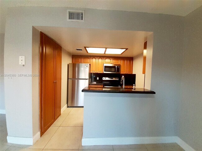 Building Photo - 8407 Coral Lake Manor