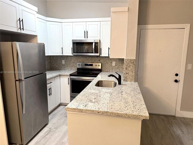 Building Photo - 9719 Hammocks Blvd