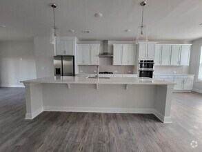 Building Photo - Beautiful Townhome with 3 bedrooms, three ...