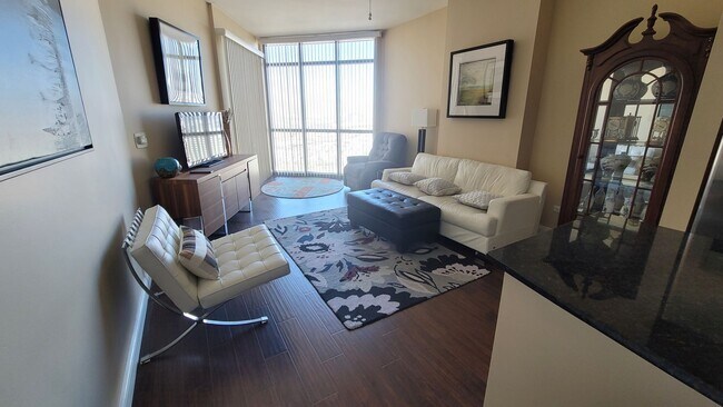 Building Photo - ***GORGEOUS FURNISHED 1 BEDROOM CONDO AT A...