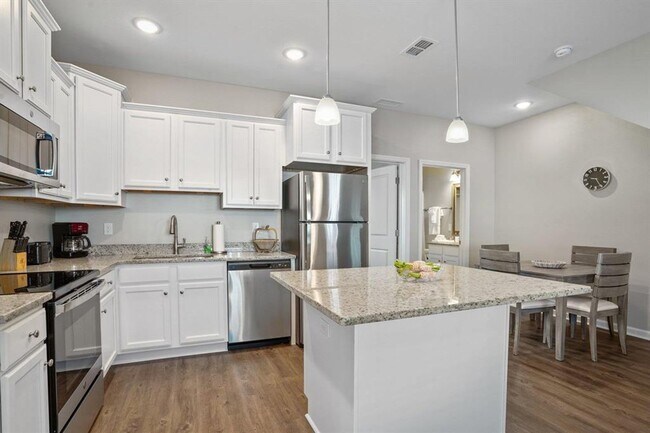 Building Photo - Spacious & Upgraded 3-Bedroom Condos with ...
