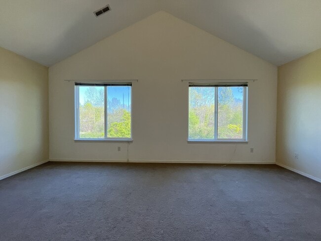 Building Photo - Spacious 3 Bedroom Home with Open Layout, Vaulted Bedrooms & Trail Access