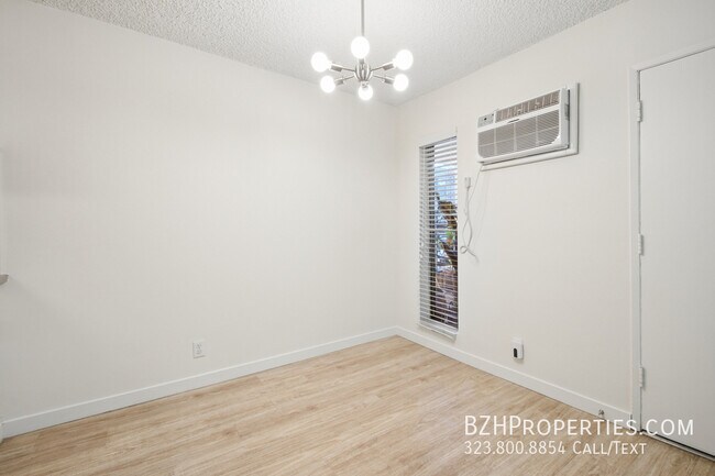 Building Photo - 7540 Hampton Ave