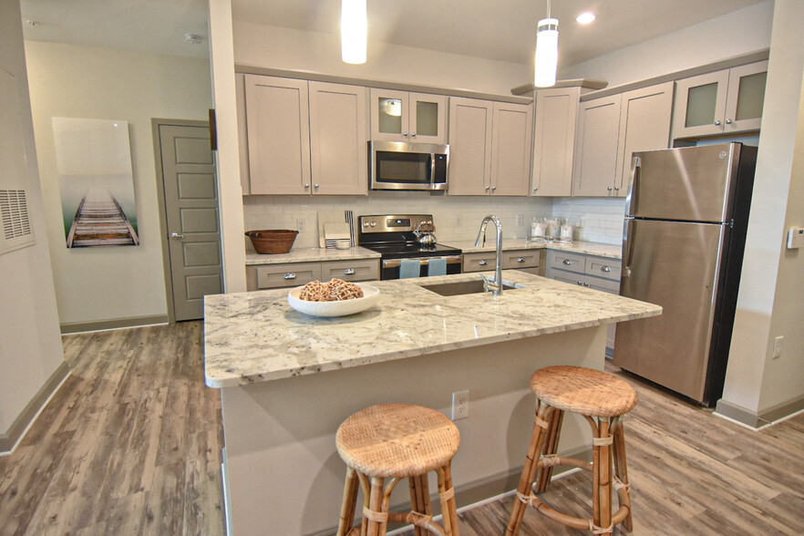 Spacious Kitchens with Wood-Inspired Flooring - Hawthorne at Smith Creek