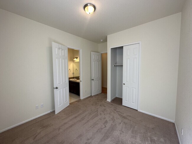 Building Photo - Modern 4-Bed Ranch in Erie with 13-Ft Ceil...
