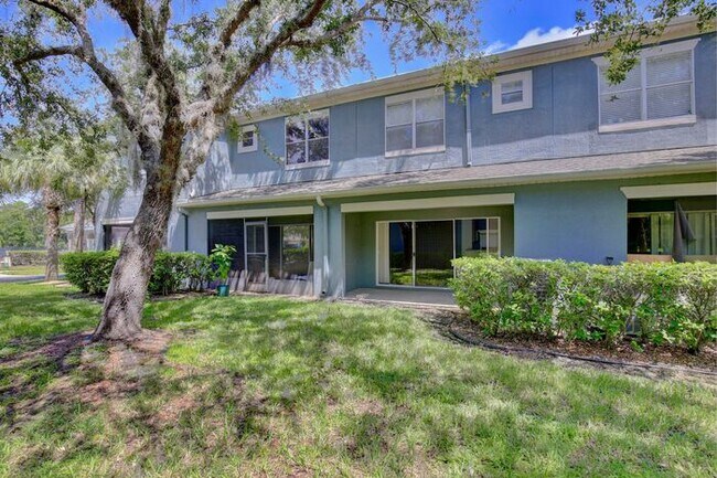 Building Photo - Beautiful 2/2.5 Cozy Townhome with a 1 Car Garage in the Gated Community of Victoria Pines - Orlando