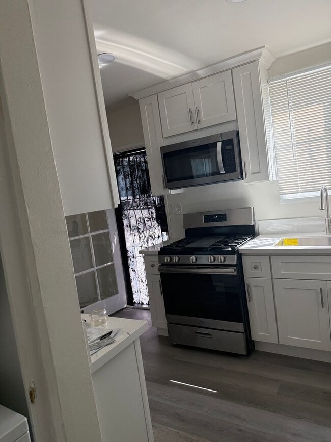 Building Photo - FOR RENT — COMPLETELY REMODELED Apartment