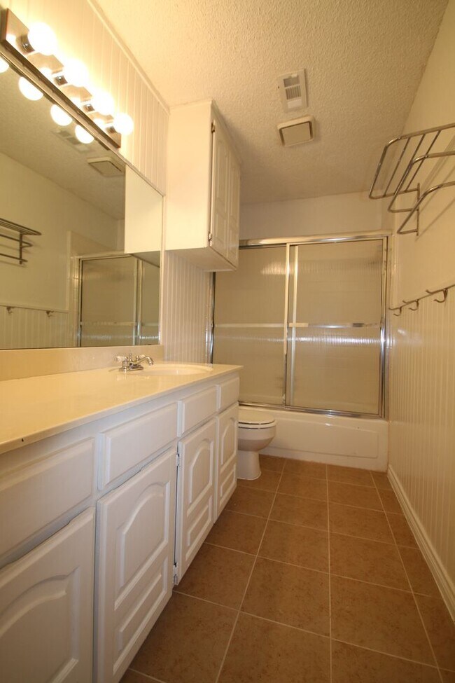 Building Photo - Corner Lot Charmer Off Chapel Creek | 4BR/2BA with Fireplace, Garden Tub & Fenced Backyard
