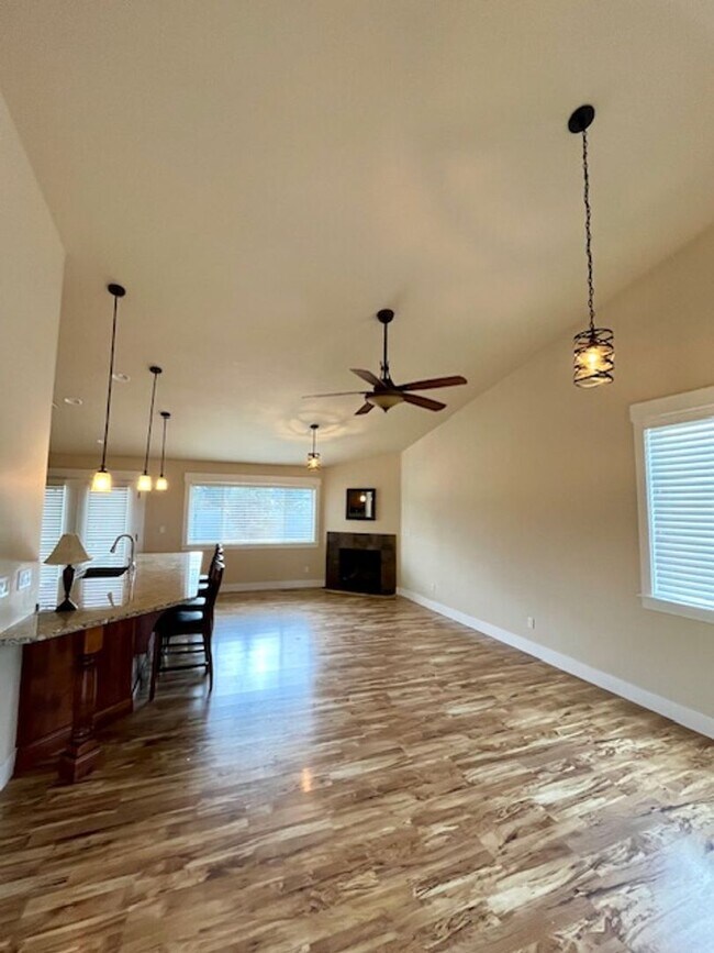 Building Photo - THREE-CAR GARAGE! This charming home offers 3 bedrooms, plus an office/rec room, and 2 bathrooms.