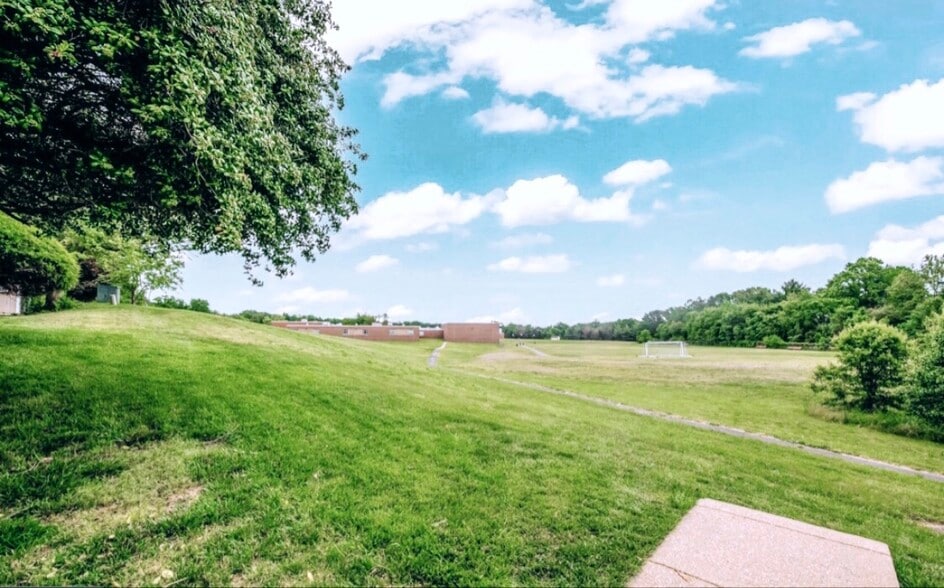 The public field right behind our fenced yard. - 4767 Kandel Ct
