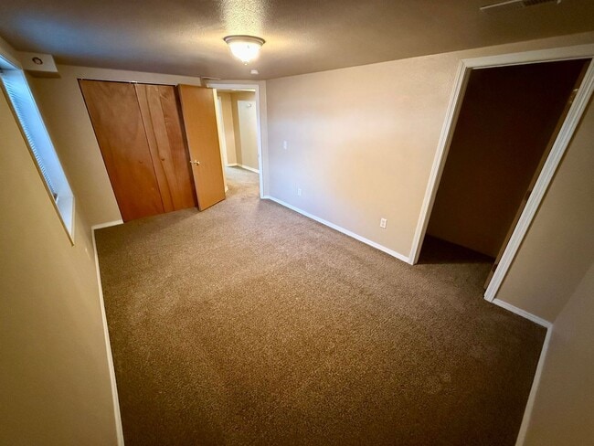 Building Photo - **For Rent: Spacious 4-Bedroom Home with 2...