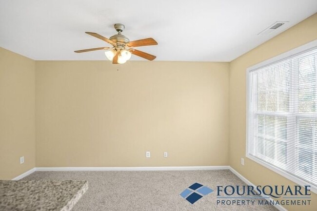 Building Photo - Charming 3-Bedroom Townhome with First-Floor Suite & Off-Street Parking – Near Capital Blvd & I-440