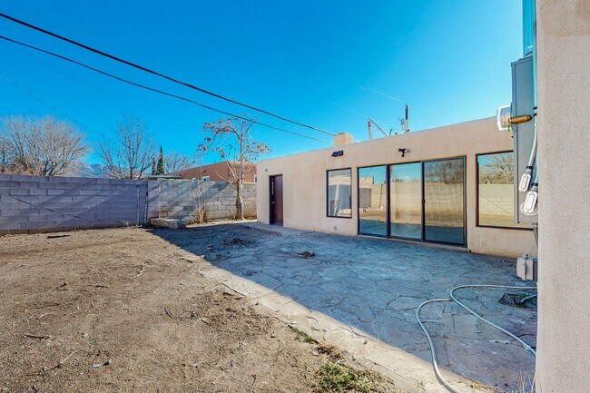 Building Photo - NE PUEBLO STYLE 3 Bedroom 2 Bath 1824/SF