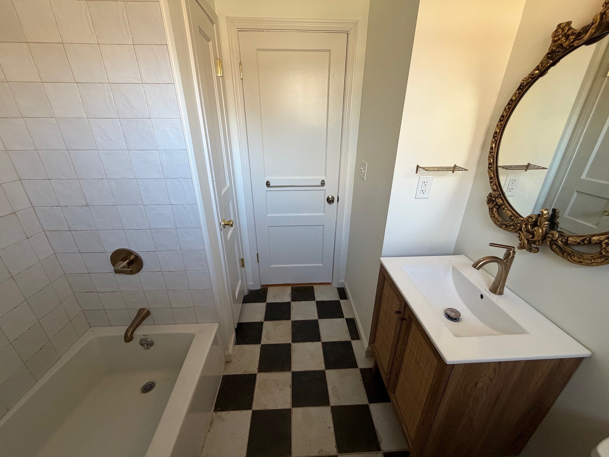 Renovated bathroom, linen closet. - 5623 Meadowcrest Ln