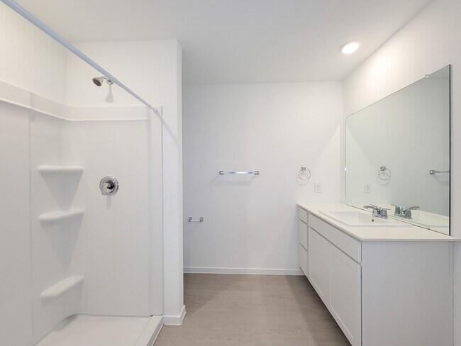Building Photo - This single-story home shares an open layout between the kitchen, nook and family room for easy e...