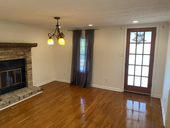 Front door entrance into Dining or Den with fireplace - 415 Wayne Duke Rd