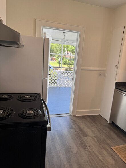 Kitchen opens to screened porch - 630 Columbus Dr