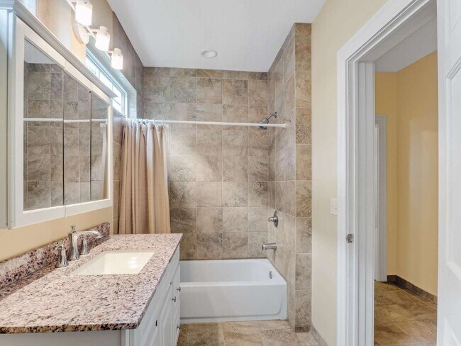 Building Photo - Gorgeous 3 BR FURNISHED Lower-Level Duplex