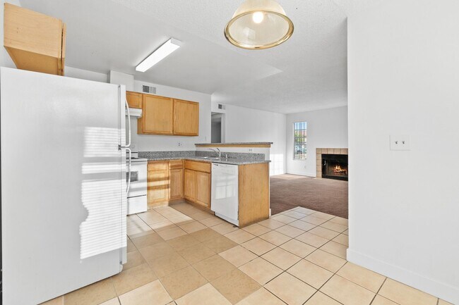Building Photo - Spacious 2-Bedroom Condo with Fireplace – ...