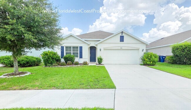 Building Photo - MOVE IN READY ! 4 BEDROOM/2 BATH! TILE- LVP THROUGHOUT! LAWN MOWING INCLUDED!