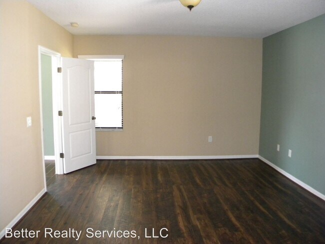 Building Photo - 4 br, 2.5 bath House - 7834 TUSCANY WOODS DR,