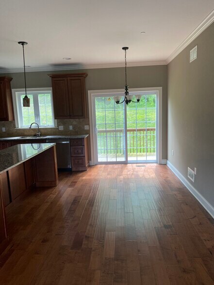 Dinning room that leads to small deck - 303 Landon Way