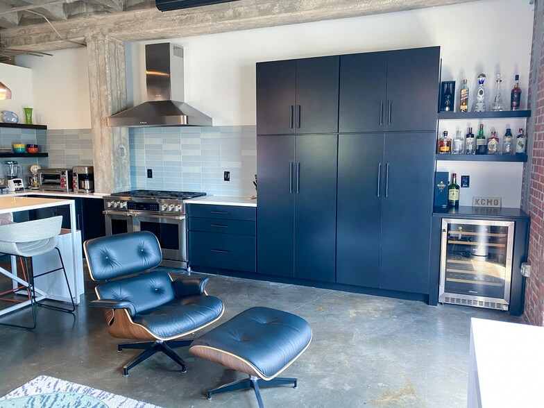 Massive pantries with pull-out shelving and bar with wine cooler - 1819 Baltimore Ave