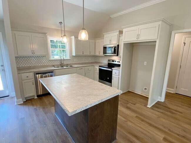 Building Photo - $500 Move-in Discount! Modern 4-Bedroom Home with Fenced Yard Near Moody AFB