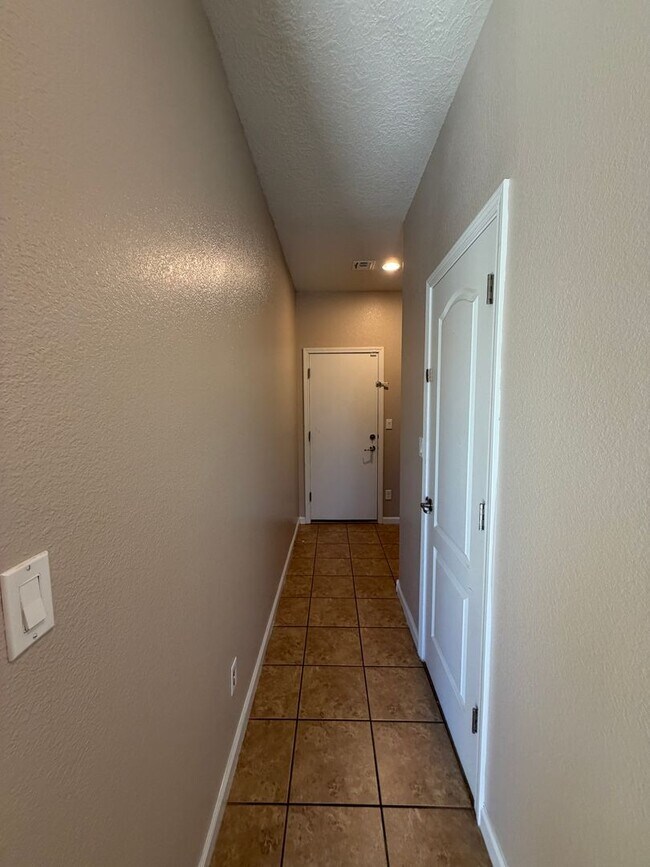 Building Photo - 4 Bedroom + Office Home Available Near Loma Colorado Blvd NE & Broadmoor Blvd NE in Rio Rancho!