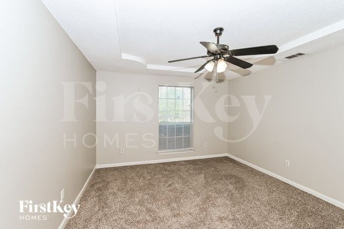 Building Photo - 7678 Breeze Wood Cove