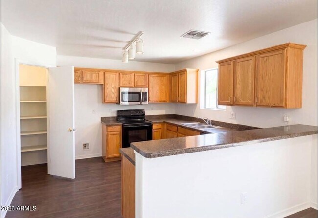 Building Photo - 13976 W Port Royale Ln