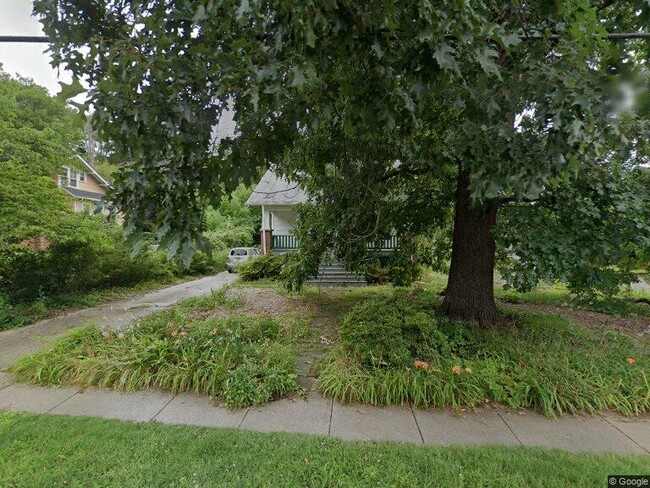 Online street view. Huge oak tree in front. - 4216 Queensbury Rd