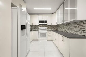 Building Photo - 3167 Cocoplum Cir