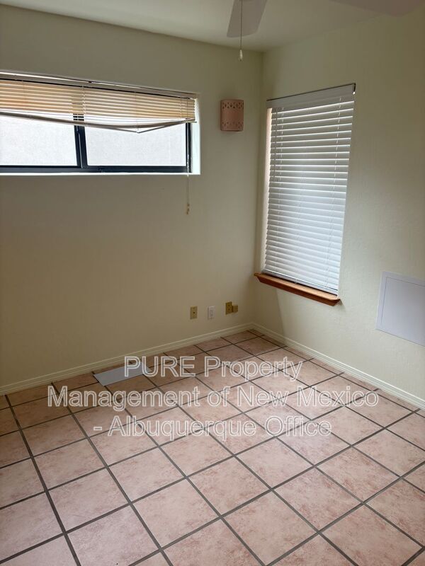 Building Photo - 8220 W Raintree Dr NE