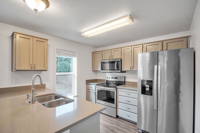 Building Photo - 3114 SE Tumblestone Dr