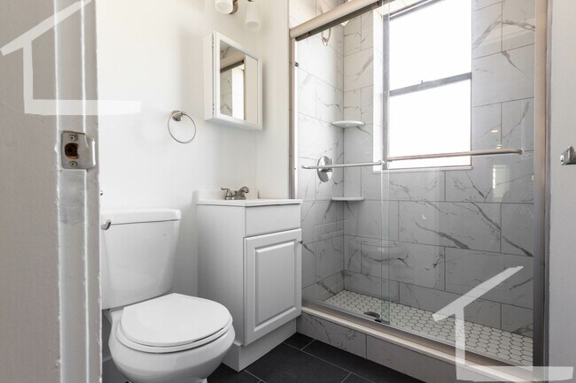Building Photo - 8/1 No Fee! - Renovated junior 1BR with laundry in unit!